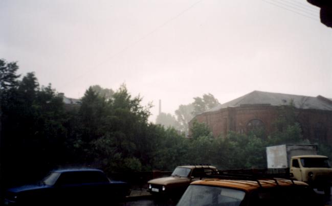 Stuck in an enormous tropical storm, we took shelter in an entryway